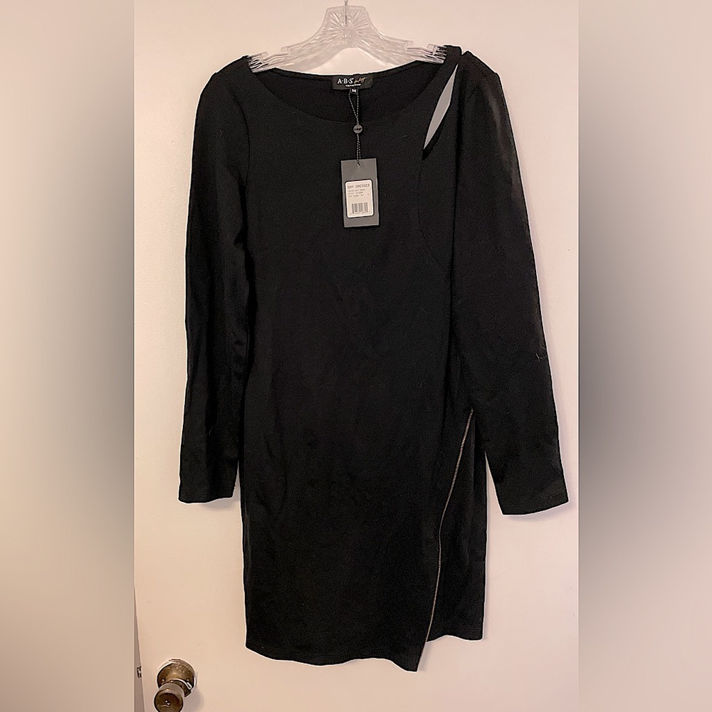 NWT ABS long sleeved cocktail dress with zipper detail and cutouts.